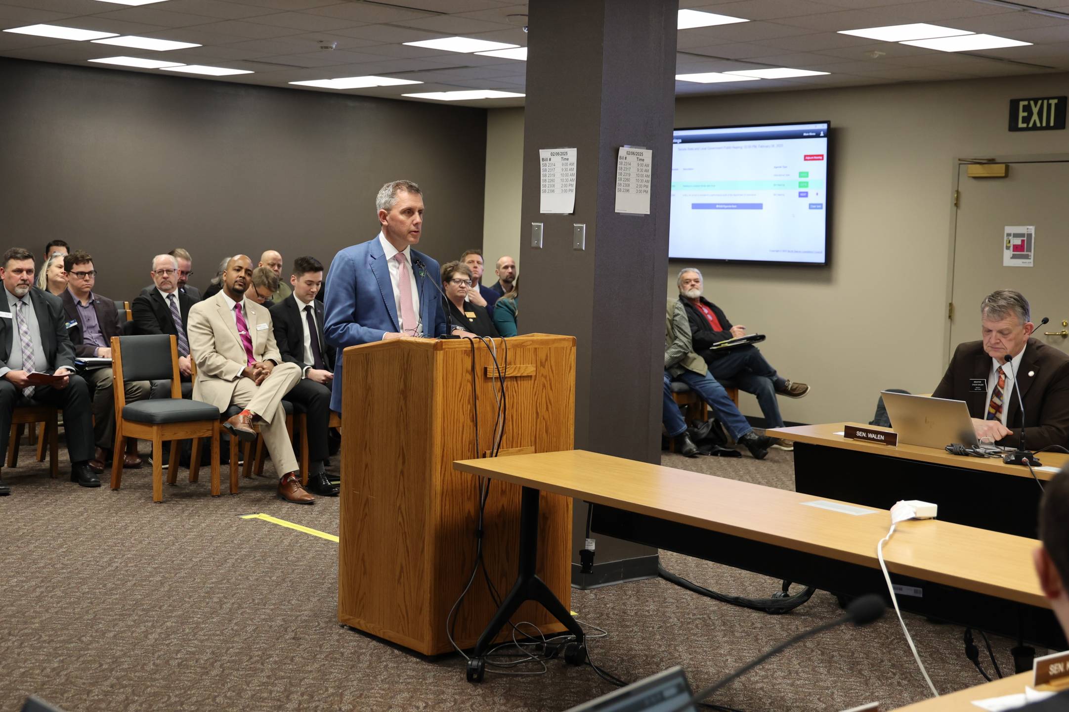 Governor Kelly Armstrong testifies on Senate Bill 2308 at the State Capitol in Bismarck